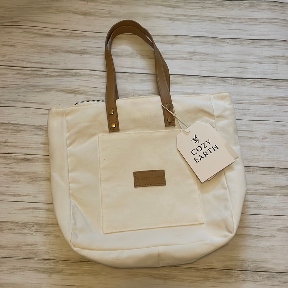 NEW! white and tan canvas bag, lined interior, front pocket, zips